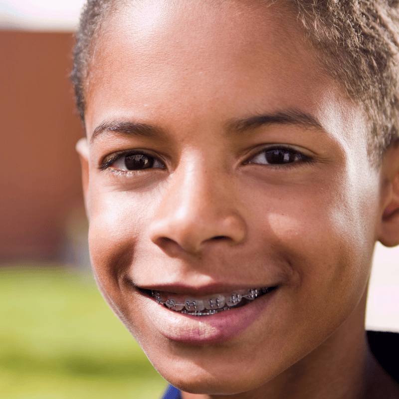 Little boy smiling with braces