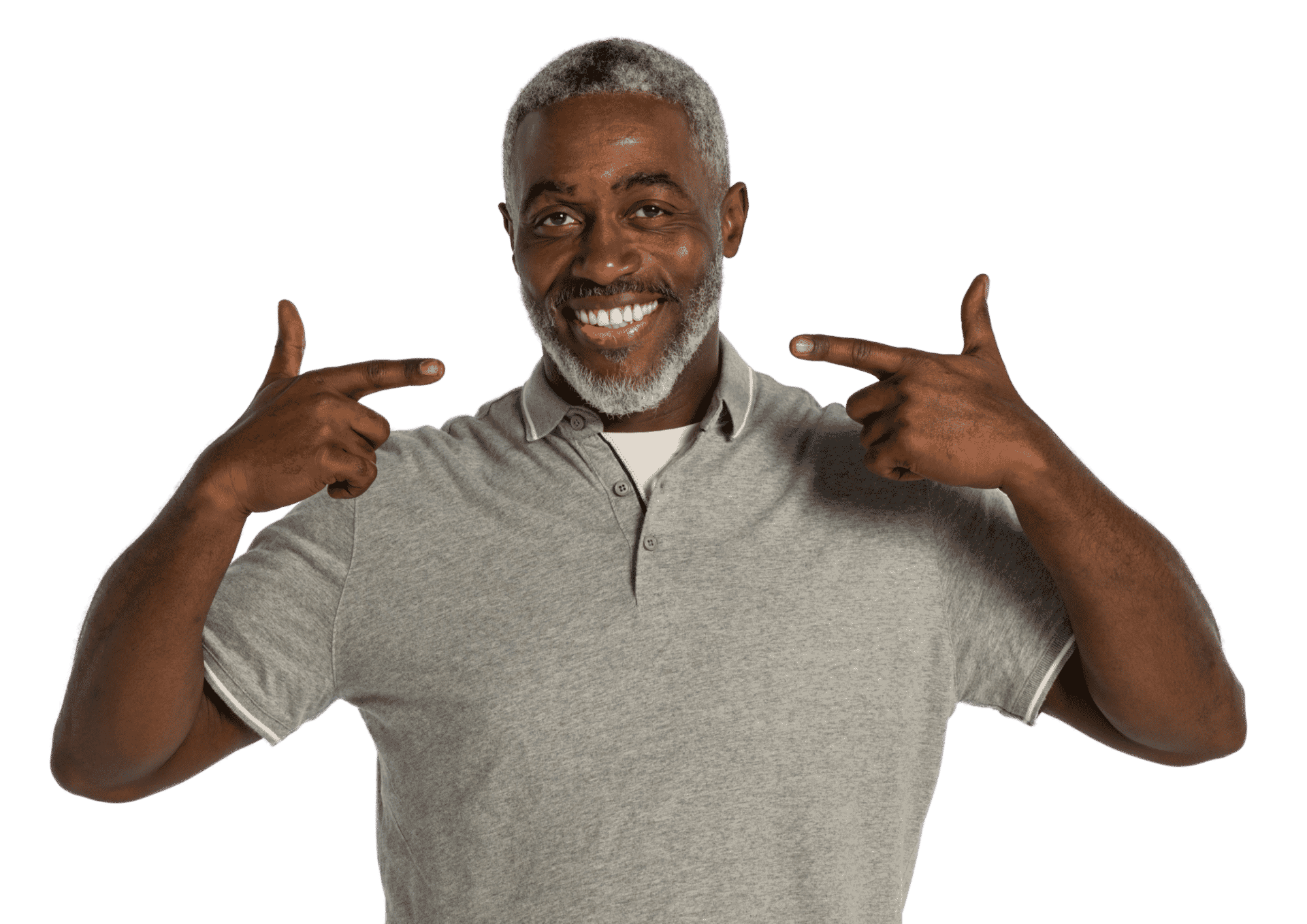 Man smiling from perfect dental implants while standing against white background in a grey shirt.
