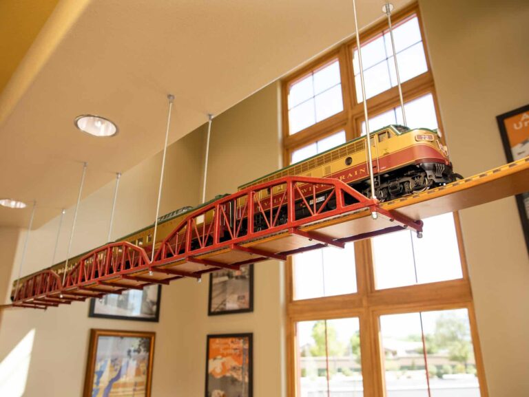 View of the model train running around the interior of the dentist office